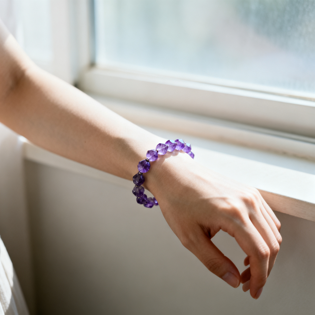 Woman's wrist wearing handmade crystal bracelet, adjustable fit