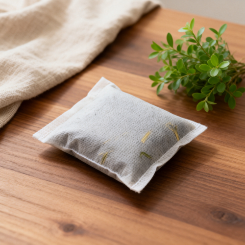 Natural bamboo charcoal air purifier on wooden table with plants