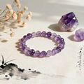 Handmade amethyst crystal bracelet on linen with raw crystals